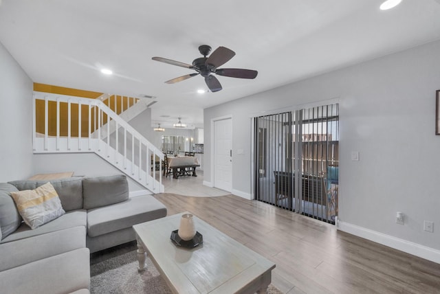 2004 SE Round Table Dr Unit 0, Port Saint Lucie, FL 34952 - living room with stairs, a ceiling fan, recessed lighting, and wood finished floors