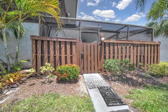 2004 SE Round Table Dr Unit 0, Port Saint Lucie, FL 34952 - fenced yard with a gate and glass enclosure