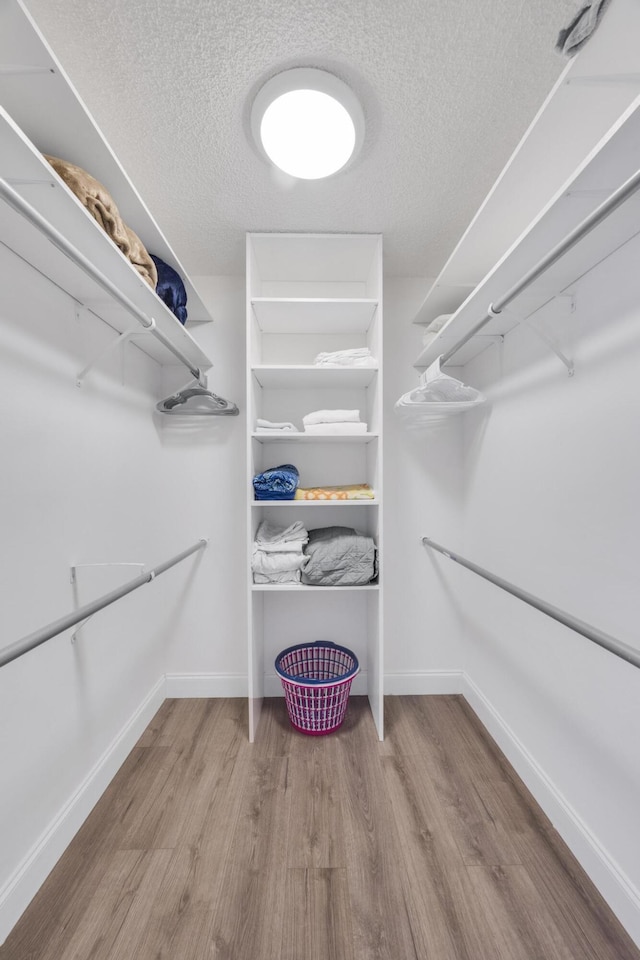 2004 SE Round Table Dr Unit 0, Port Saint Lucie, FL 34952 - spacious closet with wood finished floors