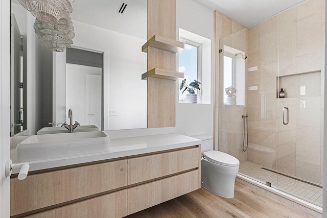 471 NW 9th St, Boca Raton, FL 33432 - bathroom with a stall shower, vanity, and wood finished floors