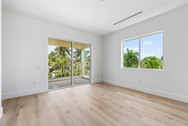471 NW 9th St, Boca Raton, FL 33432 - spare room with wood finished floors