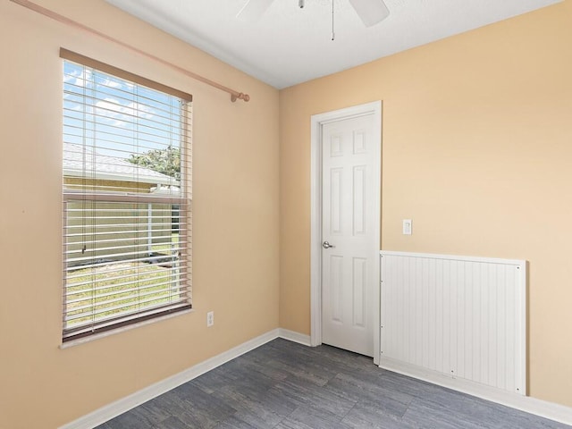 751 SE Majestic Ter, Port Saint Lucie, FL 34953 - spare room featuring ceiling fan and dark wood-style flooring
