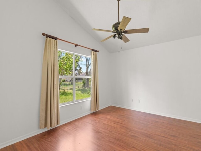 751 SE Majestic Ter, Port Saint Lucie, FL 34953 - spare room with wood finished floors, plenty of natural light, lofted ceiling, and ceiling fan