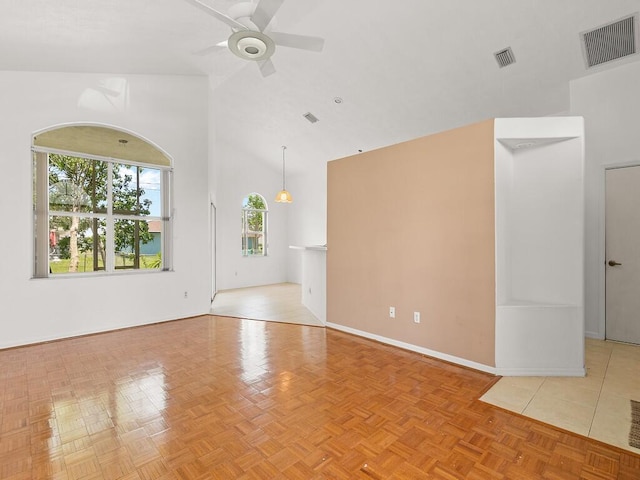 751 SE Majestic Ter, Port Saint Lucie, FL 34953 - unfurnished room with ceiling fan and high vaulted ceiling