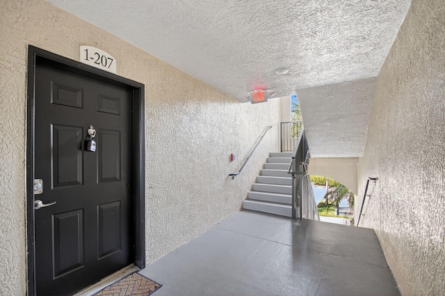 15185 Michelangelo Blvd Unit 207, Delray Beach, FL 33446 - entrance to property featuring stucco siding