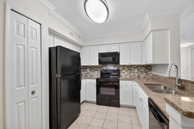15185 Michelangelo Blvd Unit 207, Delray Beach, FL 33446 - kitchen featuring black appliances, crown molding, light tile patterned floors, white cabinetry, and light stone countertops