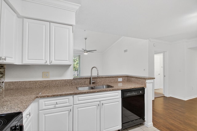 15185 Michelangelo Blvd Unit 207, Delray Beach, FL 33446 - kitchen with black appliances, ceiling fan, white cabinetry, crown molding, and a peninsula