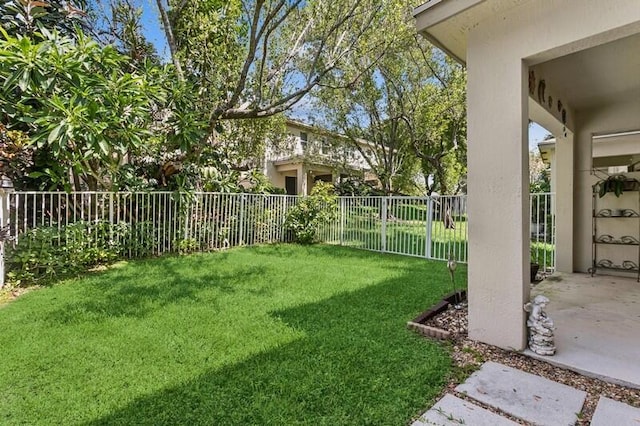 315 Spruce St, Boynton Beach, FL 33426 - fenced backyard with a patio area
