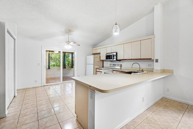 145 Waterway Rd, Royal Palm Beach, FL 33411 - kitchen featuring white appliances, a peninsula, light countertops, a textured ceiling, and a ceiling fan