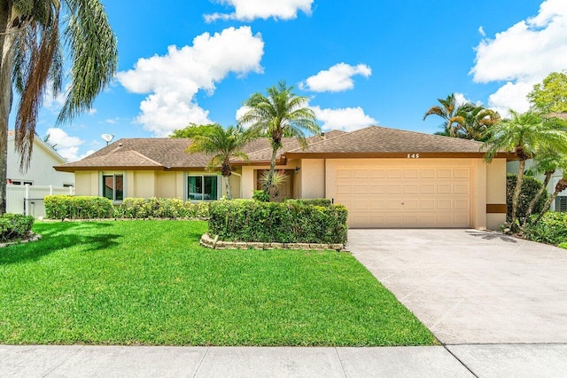 145 Waterway Rd, Royal Palm Beach, FL 33411 - single story home featuring an attached garage, stucco siding, driveway, and a front lawn