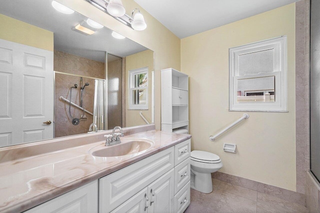 145 Waterway Rd, Royal Palm Beach, FL 33411 - bathroom featuring vanity, a shower with door, and tile patterned floors