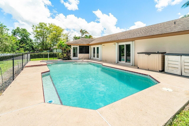 145 Waterway Rd, Royal Palm Beach, FL 33411 - view of pool with a fenced backyard, a patio area, and french doors