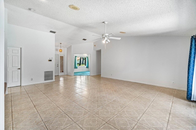 145 Waterway Rd, Royal Palm Beach, FL 33411 - unfurnished living room with ceiling fan, light tile patterned flooring, lofted ceiling, and a textured ceiling