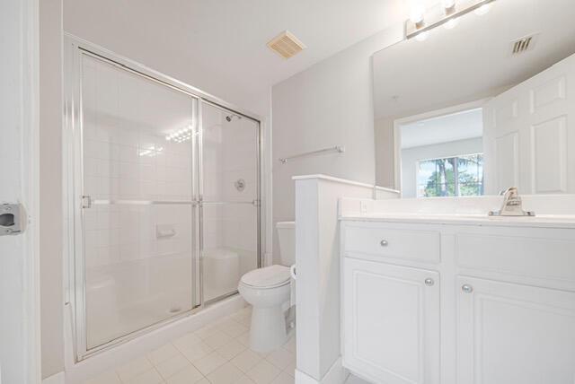 11765 W Atlantic Blvd Unit 1626, Coral Springs, FL 33071 - full bath featuring a stall shower, vanity, and tile patterned floors