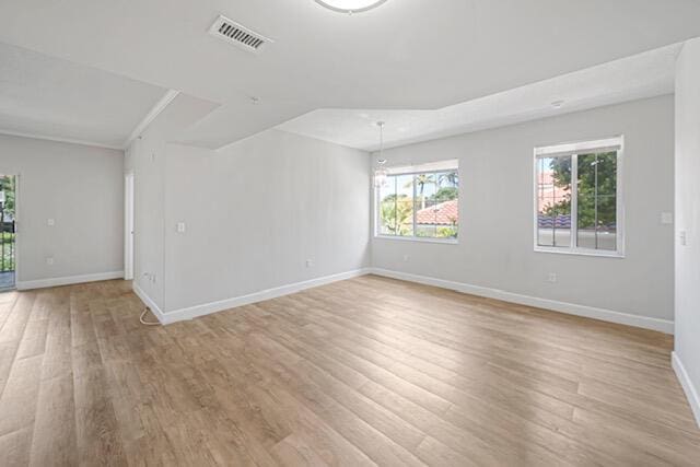 11765 W Atlantic Blvd Unit 1626, Coral Springs, FL 33071 - empty room featuring light wood-style floors