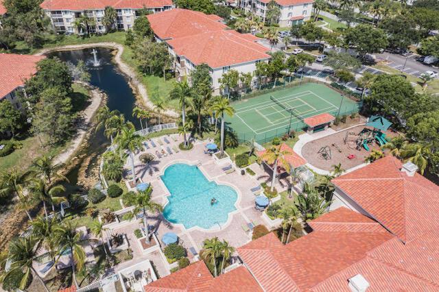 11765 W Atlantic Blvd Unit 1626, Coral Springs, FL 33071 - bird's eye view of a nearby body of water and a pool