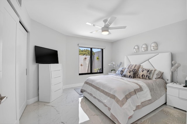 15822 Loch Maree Ln Unit 3203, Delray Beach, FL 33446 - bedroom with light marble finish flooring, a closet, and a ceiling fan