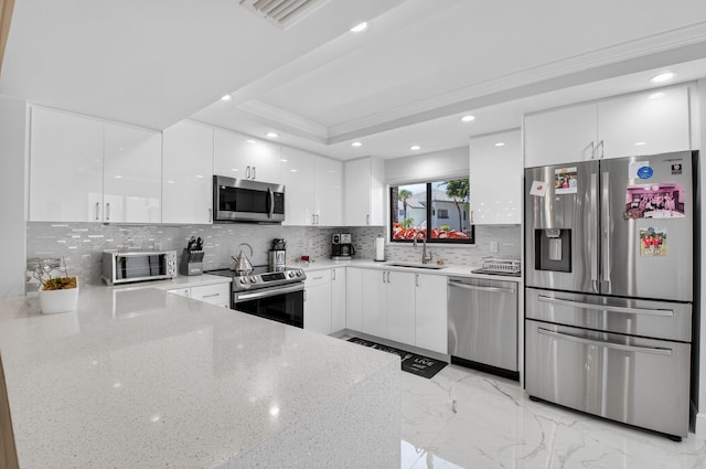 15822 Loch Maree Ln Unit 3203, Delray Beach, FL 33446 - kitchen with stainless steel appliances, modern cabinets, white cabinetry, light marble finish floors, and recessed lighting