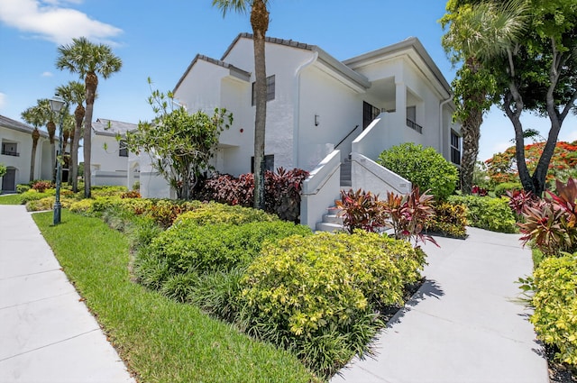 15822 Loch Maree Ln Unit 3203, Delray Beach, FL 33446 - view of property exterior featuring stucco siding