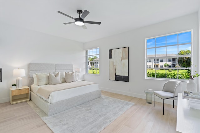 5189 Lake Catalina Dr Unit A, Boca Raton, FL 33496 - bedroom with light wood-type flooring and a ceiling fan