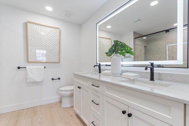 5189 Lake Catalina Dr Unit A, Boca Raton, FL 33496 - full bath featuring double vanity, recessed lighting, a tile shower, and wood finished floors