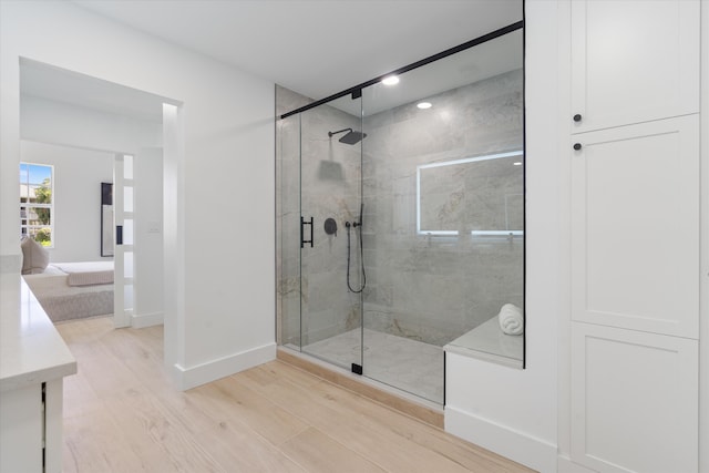 5189 Lake Catalina Dr Unit A, Boca Raton, FL 33496 - full bathroom with a stall shower, wood finished floors, vanity, and recessed lighting