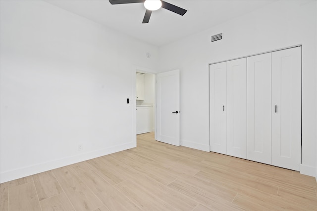 5189 Lake Catalina Dr Unit A, Boca Raton, FL 33496 - unfurnished bedroom with light wood finished floors, a closet, and ceiling fan
