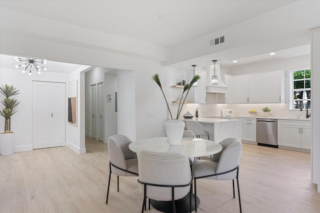 5189 Lake Catalina Dr Unit A, Boca Raton, FL 33496 - dining area with light wood finished floors, a chandelier, and recessed lighting