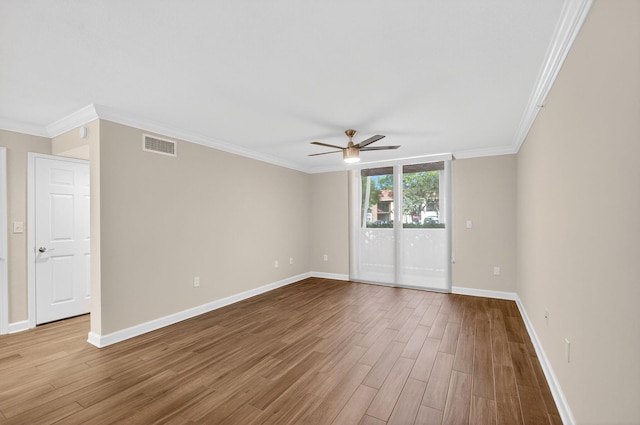 15155 Michelangelo Blvd Unit 103, Delray Beach, FL 33446 - unfurnished room featuring a ceiling fan, wood finished floors, and crown molding