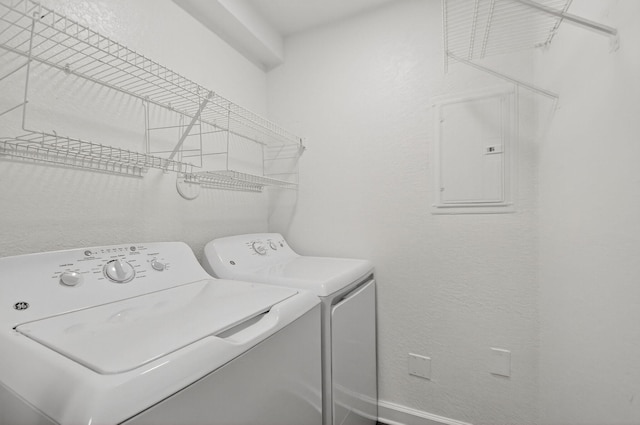 15155 Michelangelo Blvd Unit 103, Delray Beach, FL 33446 - laundry room featuring washing machine and dryer and electric panel