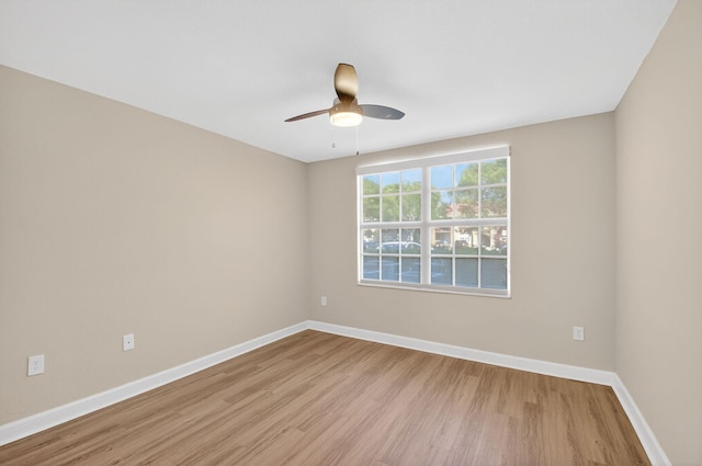 15155 Michelangelo Blvd Unit 103, Delray Beach, FL 33446 - empty room with light wood-style floors and a ceiling fan