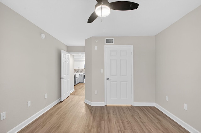 15155 Michelangelo Blvd Unit 103, Delray Beach, FL 33446 - unfurnished bedroom with light wood finished floors and a ceiling fan