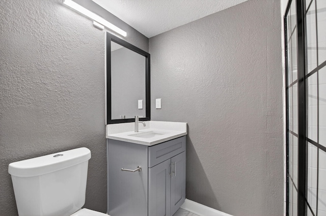 15155 Michelangelo Blvd Unit 103, Delray Beach, FL 33446 - bathroom featuring vanity and a textured wall