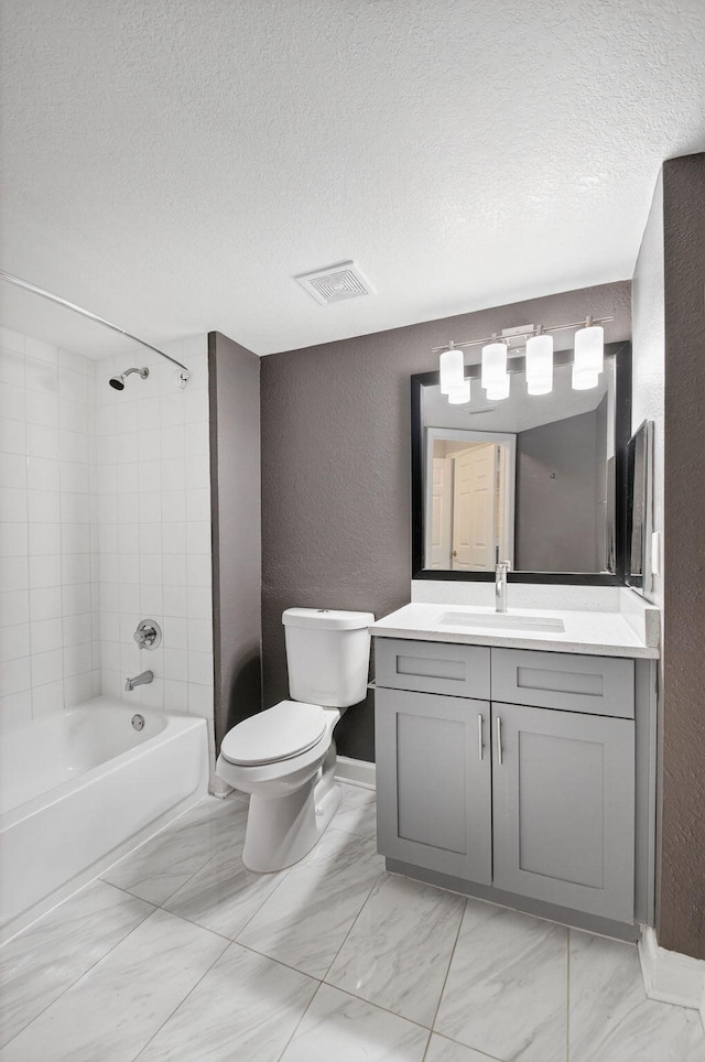 15155 Michelangelo Blvd Unit 103, Delray Beach, FL 33446 - full bathroom with a textured wall, marble look tile flooring, vanity, shower / bathtub combination, and a textured ceiling