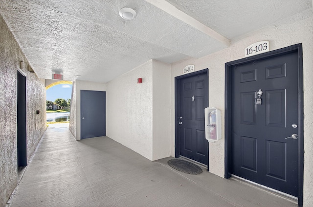 15155 Michelangelo Blvd Unit 103, Delray Beach, FL 33446 - entrance to property with stucco siding