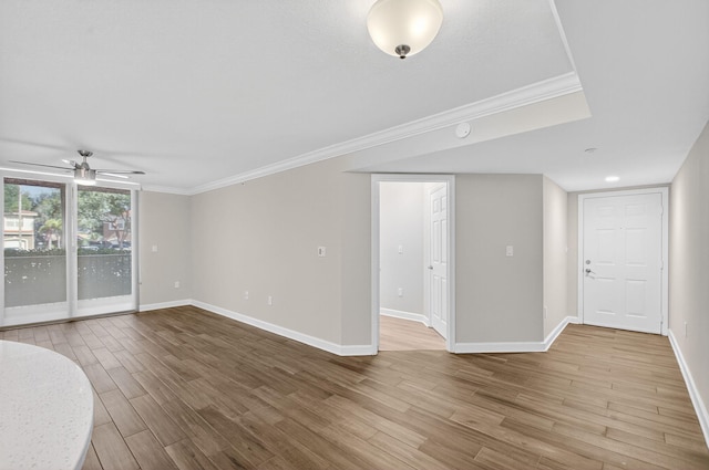 15155 Michelangelo Blvd Unit 103, Delray Beach, FL 33446 - unfurnished living room with wood finished floors, ornamental molding, and ceiling fan
