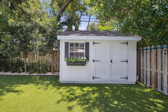 1116 SE 11th St, Fort Lauderdale, FL 33316 - view of shed featuring a fenced backyard
