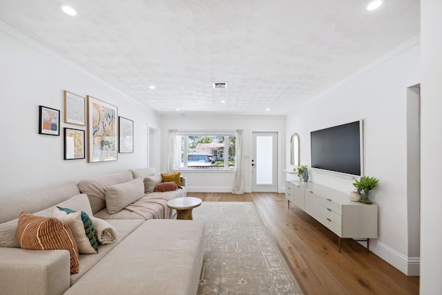 1116 SE 11th St, Fort Lauderdale, FL 33316 - living room featuring recessed lighting, wood finished floors, and crown molding