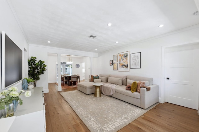 1116 SE 11th St, Fort Lauderdale, FL 33316 - living area with light wood-style flooring, crown molding, recessed lighting, and ornate columns
