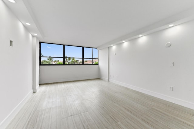 899 Jeffery St Unit 208, Boca Raton, FL 33487 - empty room with recessed lighting