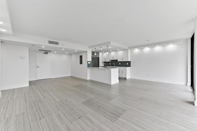 899 Jeffery St Unit 208, Boca Raton, FL 33487 - unfurnished living room with recessed lighting and baseboards