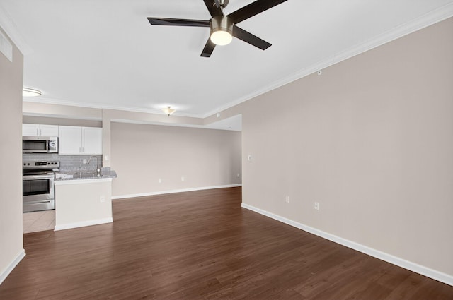 15045 Michelangelo Blvd Unit 104, Delray Beach, FL 33446 - unfurnished living room with crown molding, dark wood finished floors, and a ceiling fan