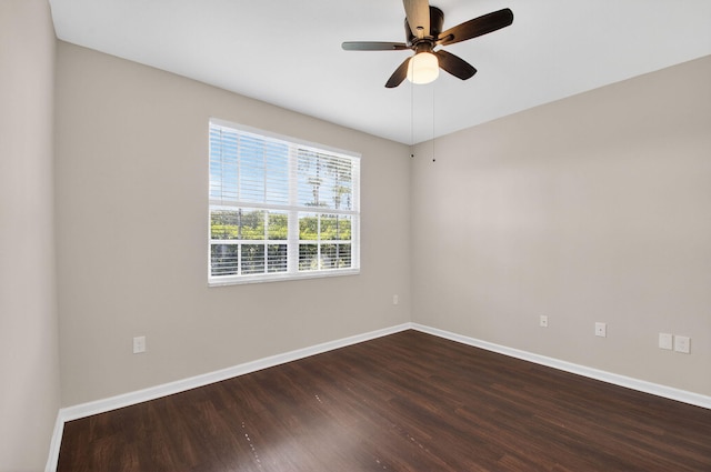 15045 Michelangelo Blvd Unit 104, Delray Beach, FL 33446 - spare room with dark wood-style flooring and ceiling fan