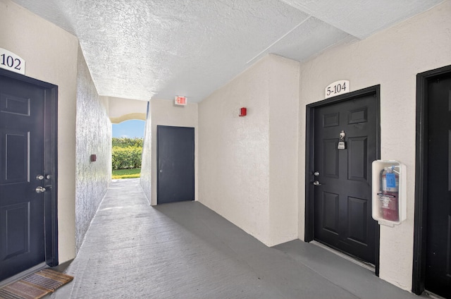 15045 Michelangelo Blvd Unit 104, Delray Beach, FL 33446 - view of exterior entry featuring stucco siding