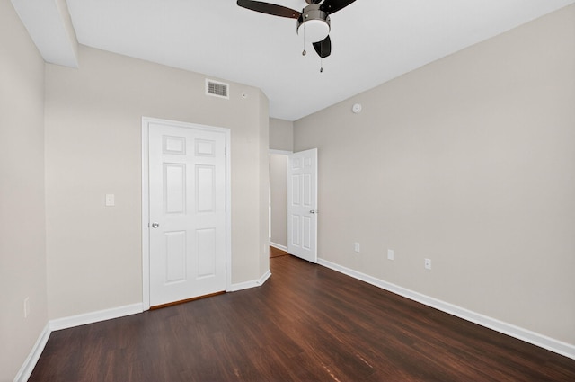 15045 Michelangelo Blvd Unit 104, Delray Beach, FL 33446 - unfurnished bedroom featuring dark wood finished floors and ceiling fan