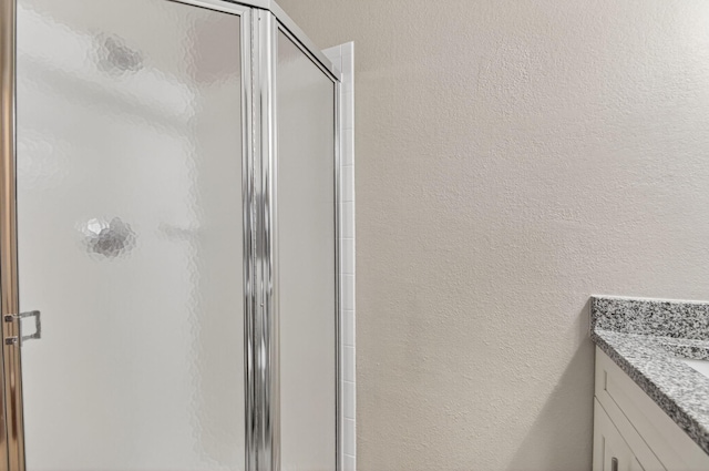 15045 Michelangelo Blvd Unit 104, Delray Beach, FL 33446 - bathroom featuring a shower stall and vanity