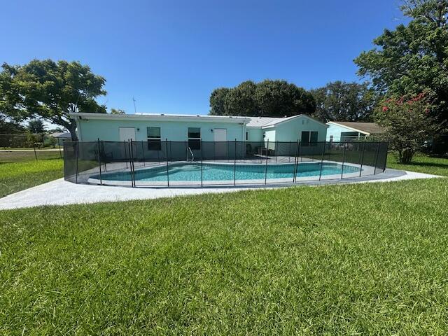 1910 SE Rainier Rd, Port Saint Lucie, FL 34952 - rear view of house