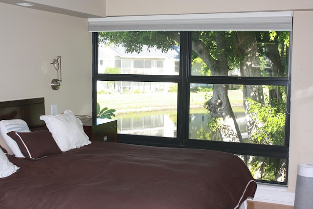 6864 Willow Wood Dr Unit 408, Boca Raton, FL 33434 - bedroom with a water view