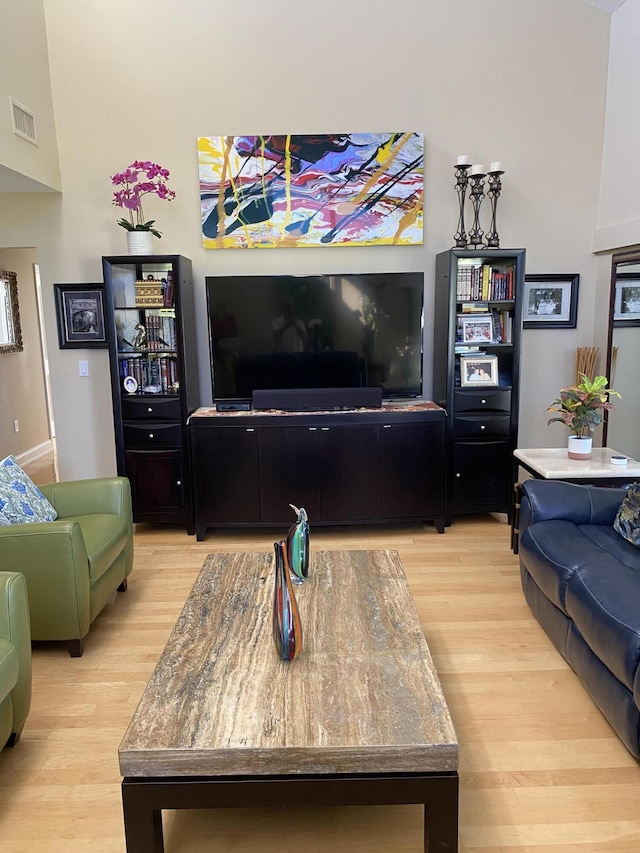 6864 Willow Wood Dr Unit 408, Boca Raton, FL 33434 - living room featuring light wood-style flooring