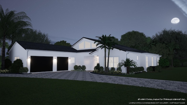 6189 Woodcutter Ct, Palm Beach Gardens, FL 33418 - view of front facade featuring a garage, decorative driveway, stucco siding, and a lawn